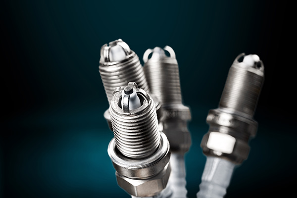 How Do Fresh Spark Plugs Improve Engine Performance?